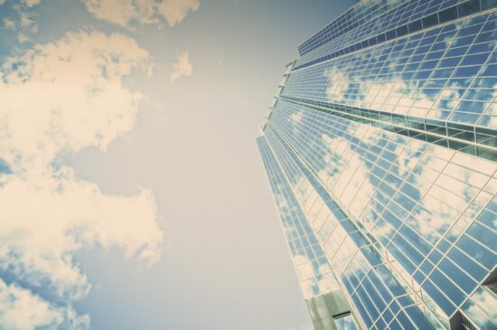 looking up to a building of a Professional Bodies Climate Action Charter member towering in the sky