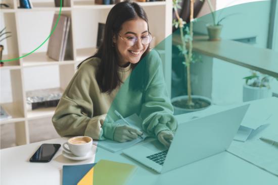 News cover image for Society for the Environment. Branded with colour quarter circle features. Background with young female in casual clothing smiling at laptop on her desk. A bright and airy image in a modern office.